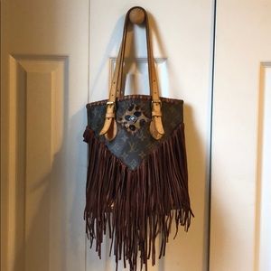 Louis Vuitton Fringe Bucket Bag. Relined.